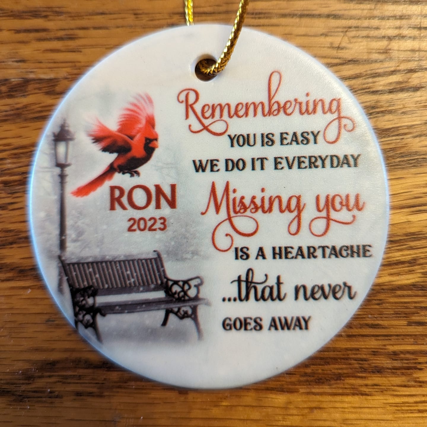 Customer photo review of Cardinals Winter Memorial Personalized Circle Ornament