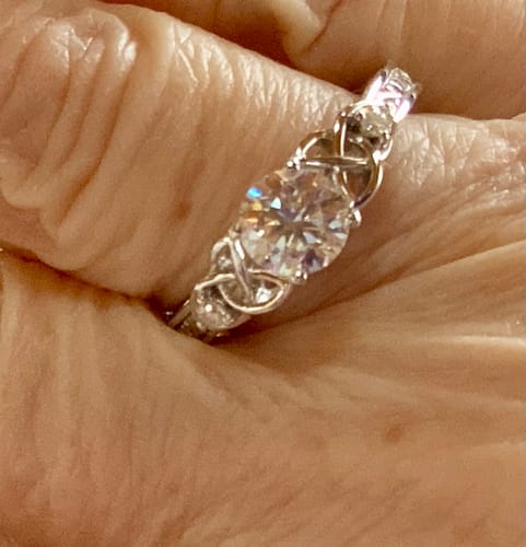 Customer photo review of Vintage Three Stone Moissanite Scrollwork Engagement Ring
