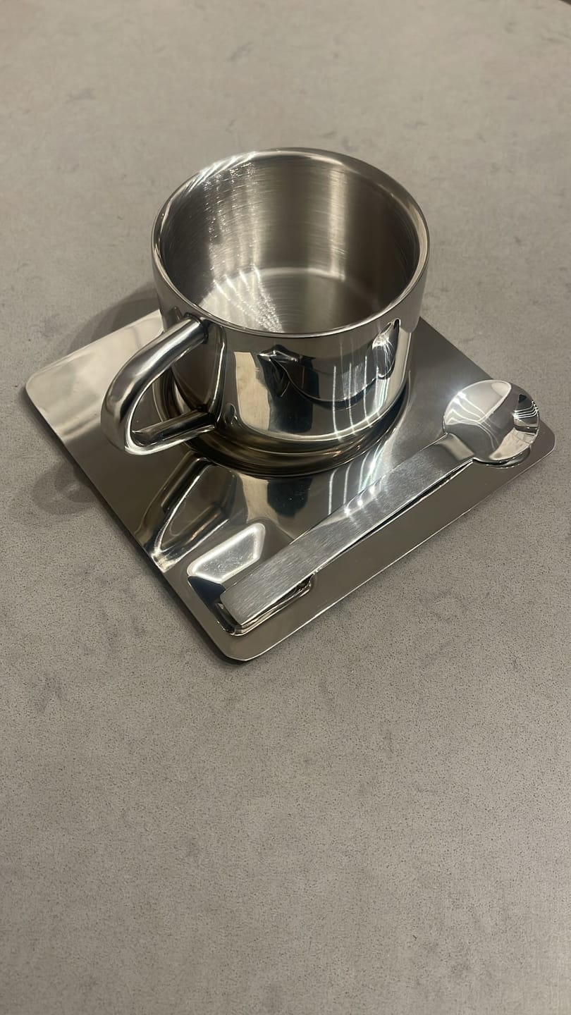 Customer photo review of Steel Coffee Cup with Square Saucer & Spoon