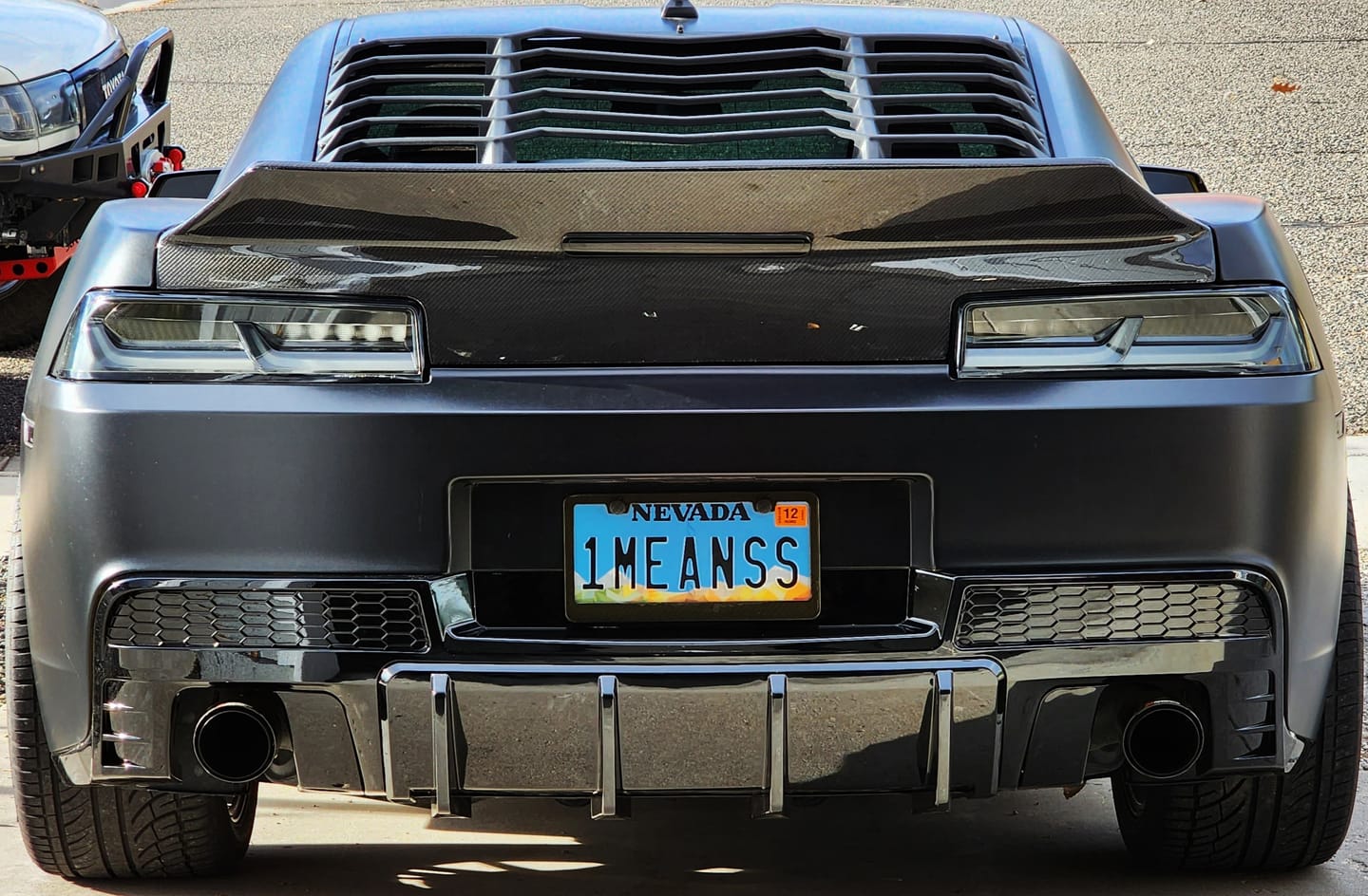 Customer photo review of 2014-2015 Chevy Camaro Evo Style Shark Fins Rear Diffuser Quad/Single Tips