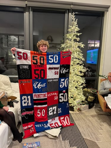 T-shirt quilt with sports, football themes by Jane from AZ
