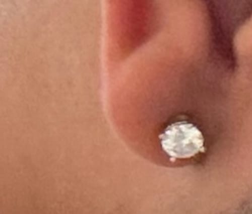 Customer photo review of VVS Moissanite Solitaire Stud Earrings