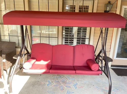 Customer photo review of 3-Seat Outdoor Porch Swing with Cupholders, Adjustable Canopy and Backrest, Wine Red