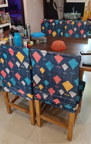 Customer photo review of Kai Po Che Design Magic Universal Dining Chair Covers