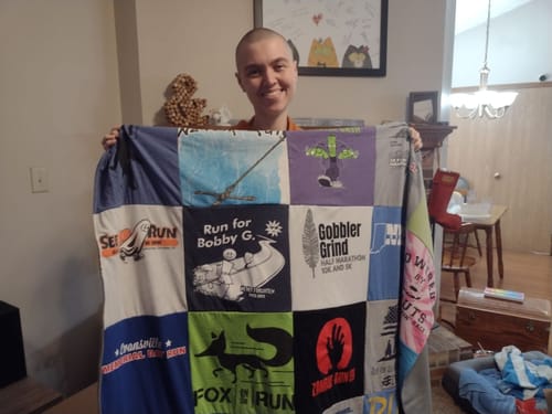 T-shirt quilt with running, charity events themes by janet from KY