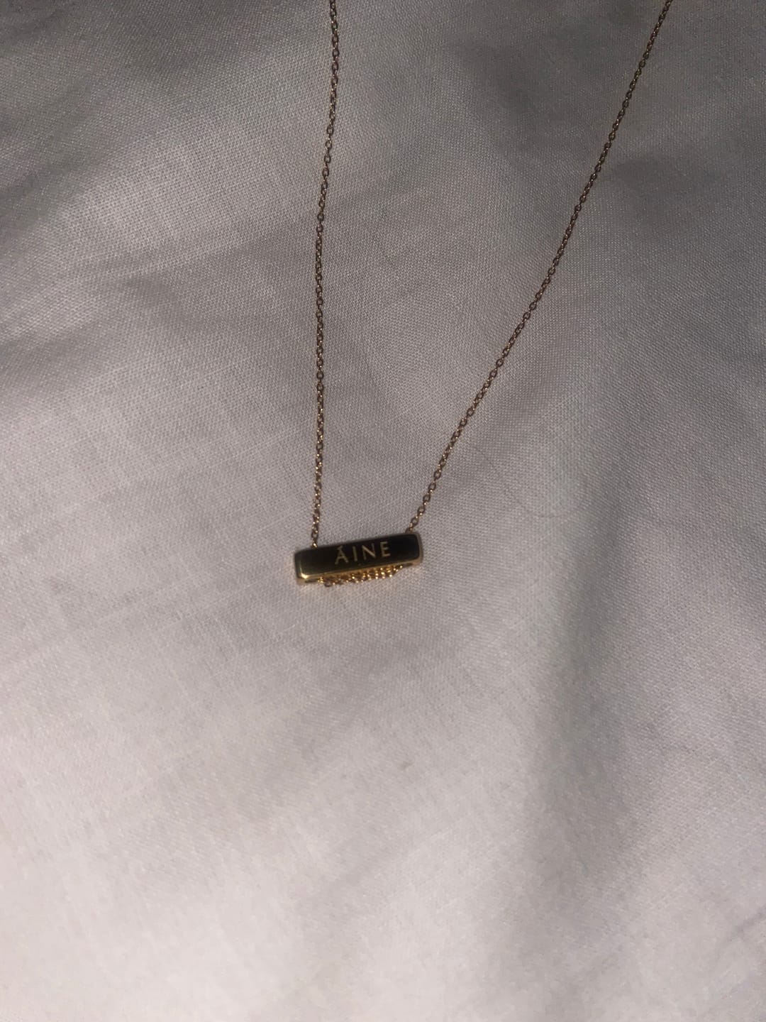 Customer photo review of 2cm Letter Bar Necklace Gold Horizontal