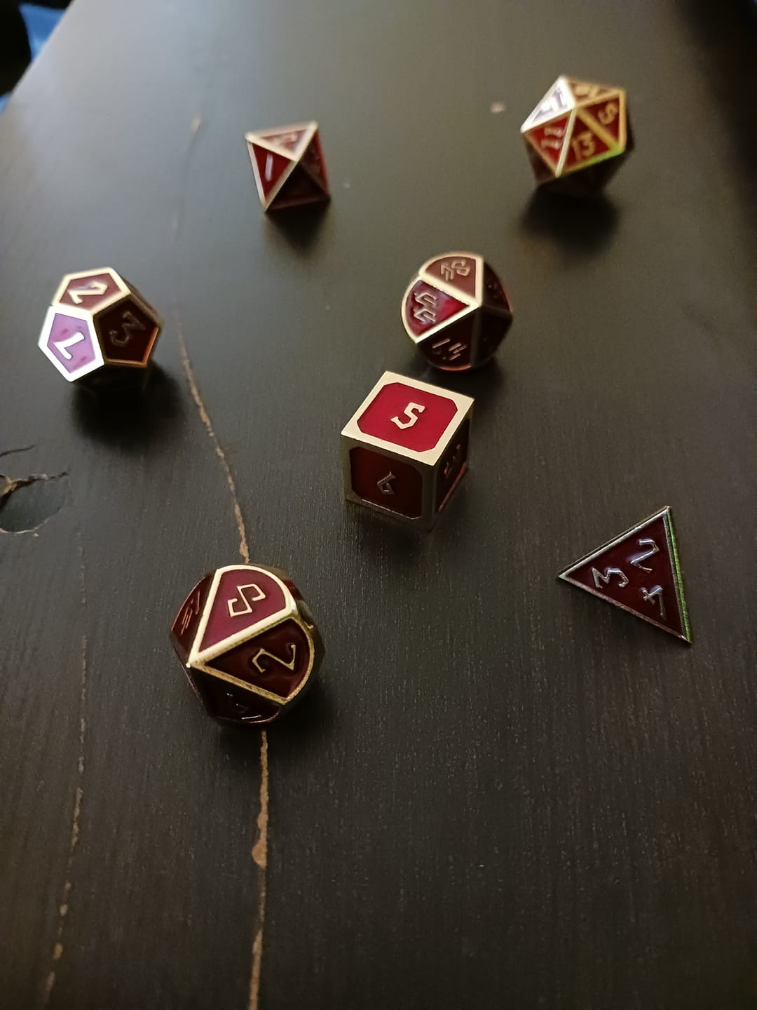 Customer photo review of Elder Runes Crimson Blood And Gold Metal Dice Set