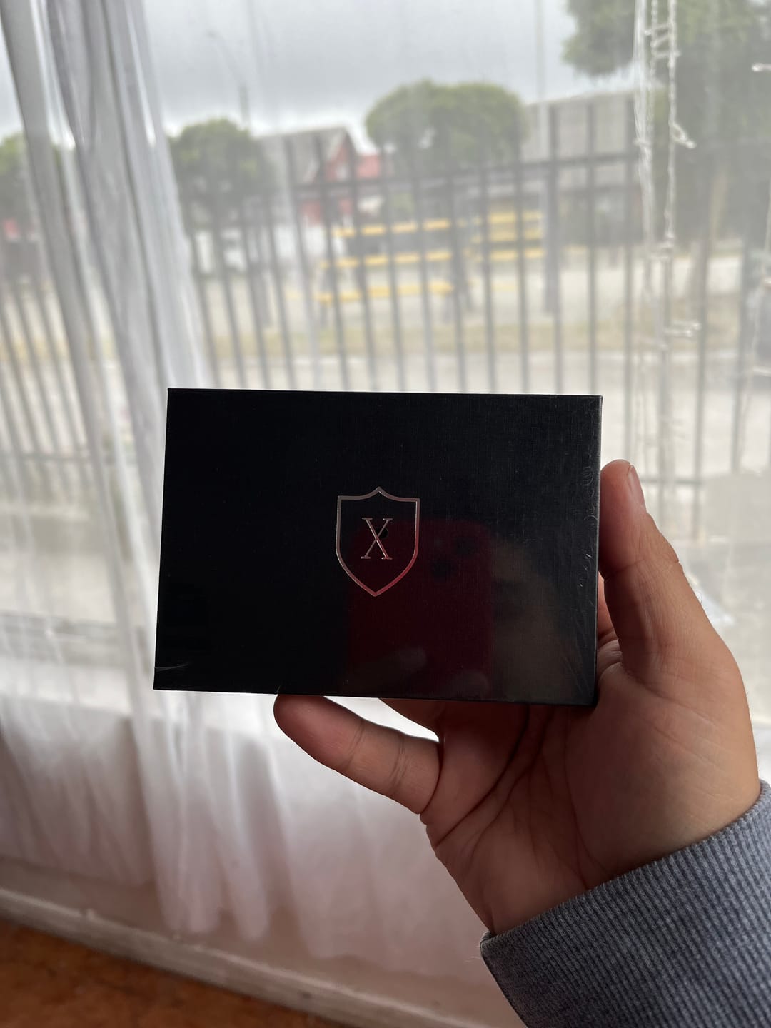 Customer photo review of Black & Red Airtag