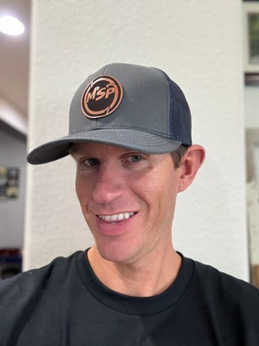 Customer photo review of Custom Leather Patch Trucker Hat - Richardson 112