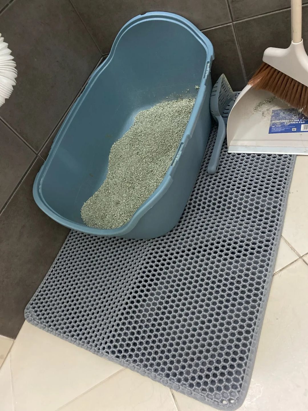 Customer photo review of Tapis pour bac à litière pour chat double couche et imperméable