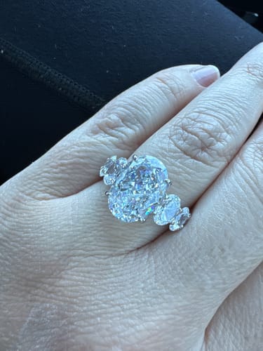 Customer photo review of Louily Luxury Crushed Ice Oval Cut Seven Stone Engagement Ring