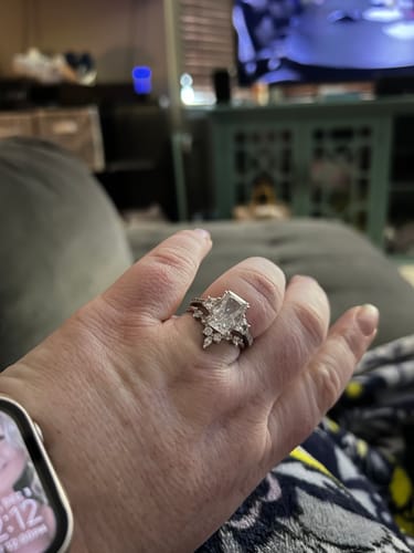 Customer photo review of Louily Gorgeous Three Stone Crushed Ice Radiant Cut Engagement Ring