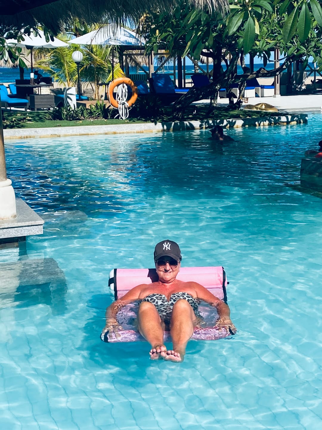Customer photo review of Green with Envy - with attachable waterproof phone sleeve and inflatable drink holder.