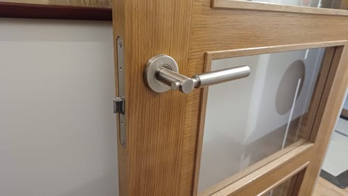 Customer photo review of Manilla Grian con Roseta Redonda de acero Inoxidable para puertas