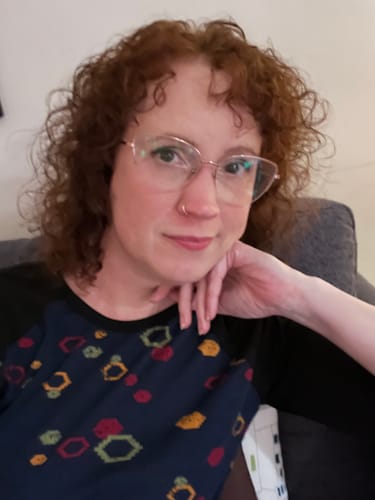 Customer photo review of Curly Chestnut Slip-On Hair Extensions 180G 22”