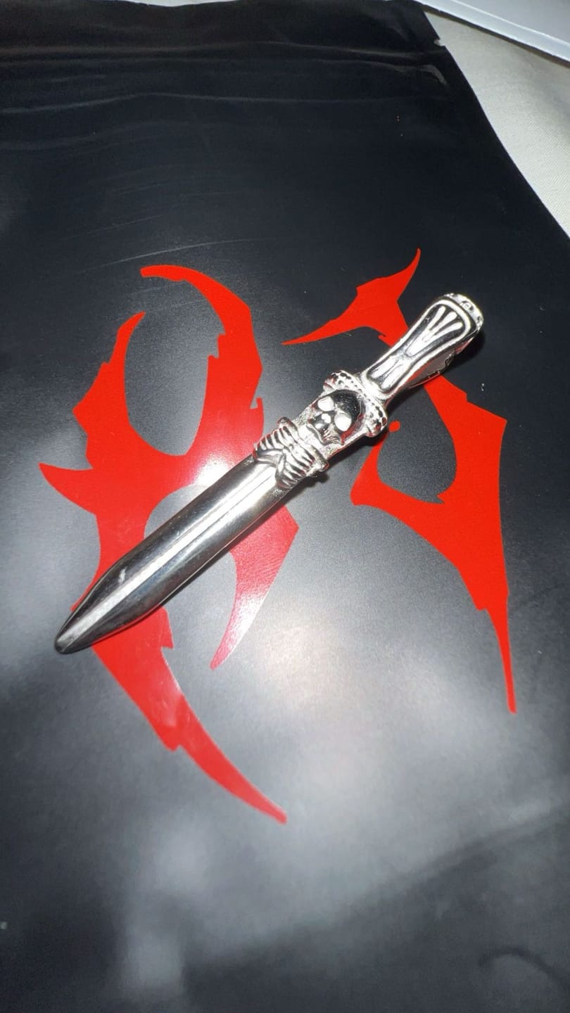 Customer photo review of CATACOMB SWORD PENDANT