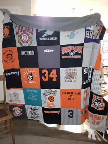 T-shirt quilt featuring sherman huskies by Lauri from OR