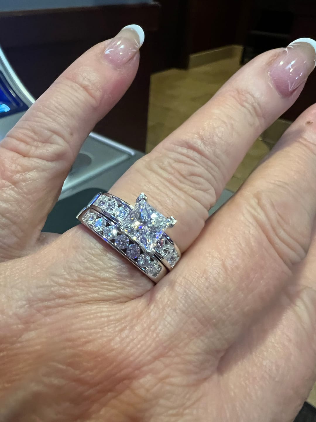 Customer photo review of Princess Cut Moissanite With Round Channel Set Engagement Ring