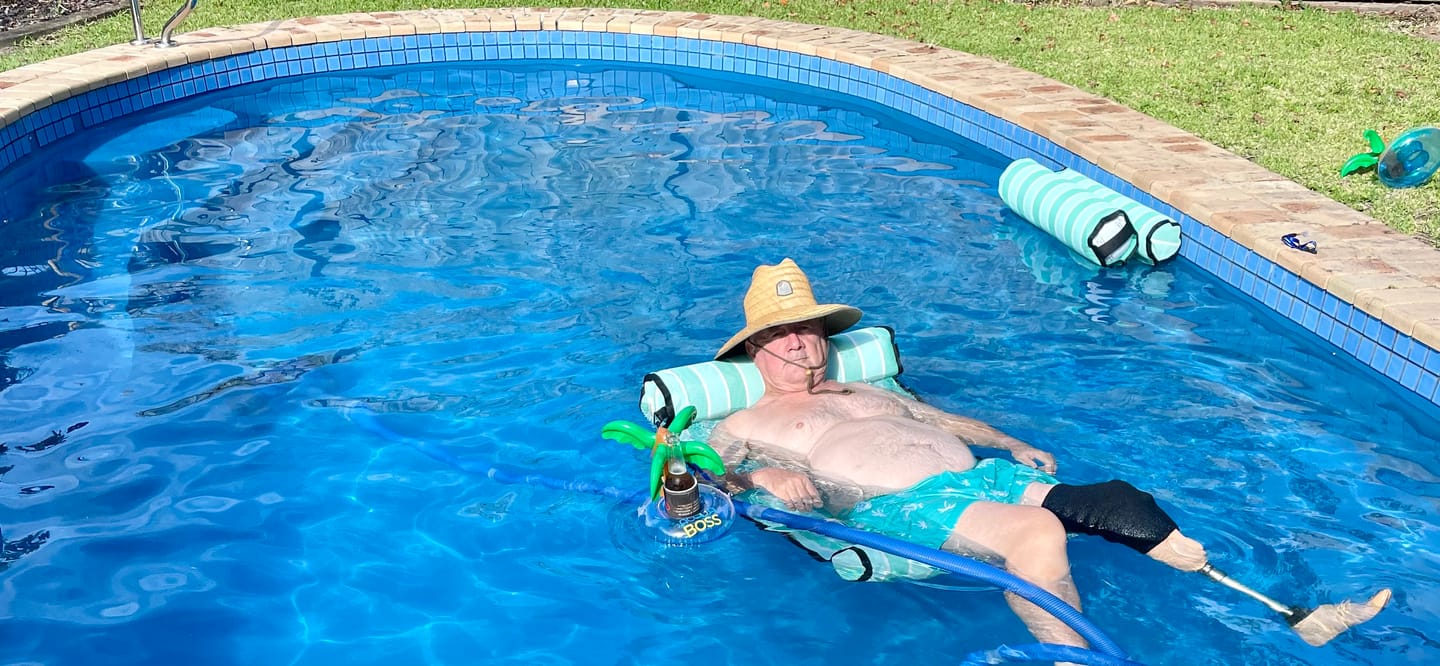 Customer photo review of Green with Envy - with attachable waterproof phone sleeve and inflatable drink holder.