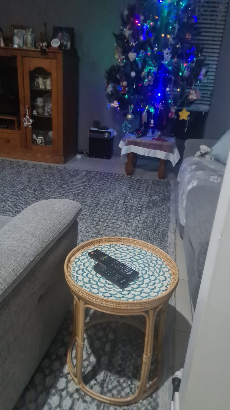 Customer photo review of Bloom Rattan Table