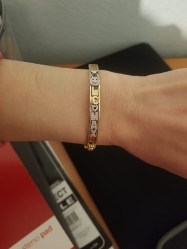 Customer photo review of Personalized Skinny Charm Bangle ™