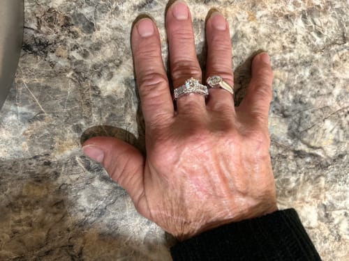 Customer photo review of Solitaire Moissanite Half Bezel Set Sterling Silver Engagement Ring