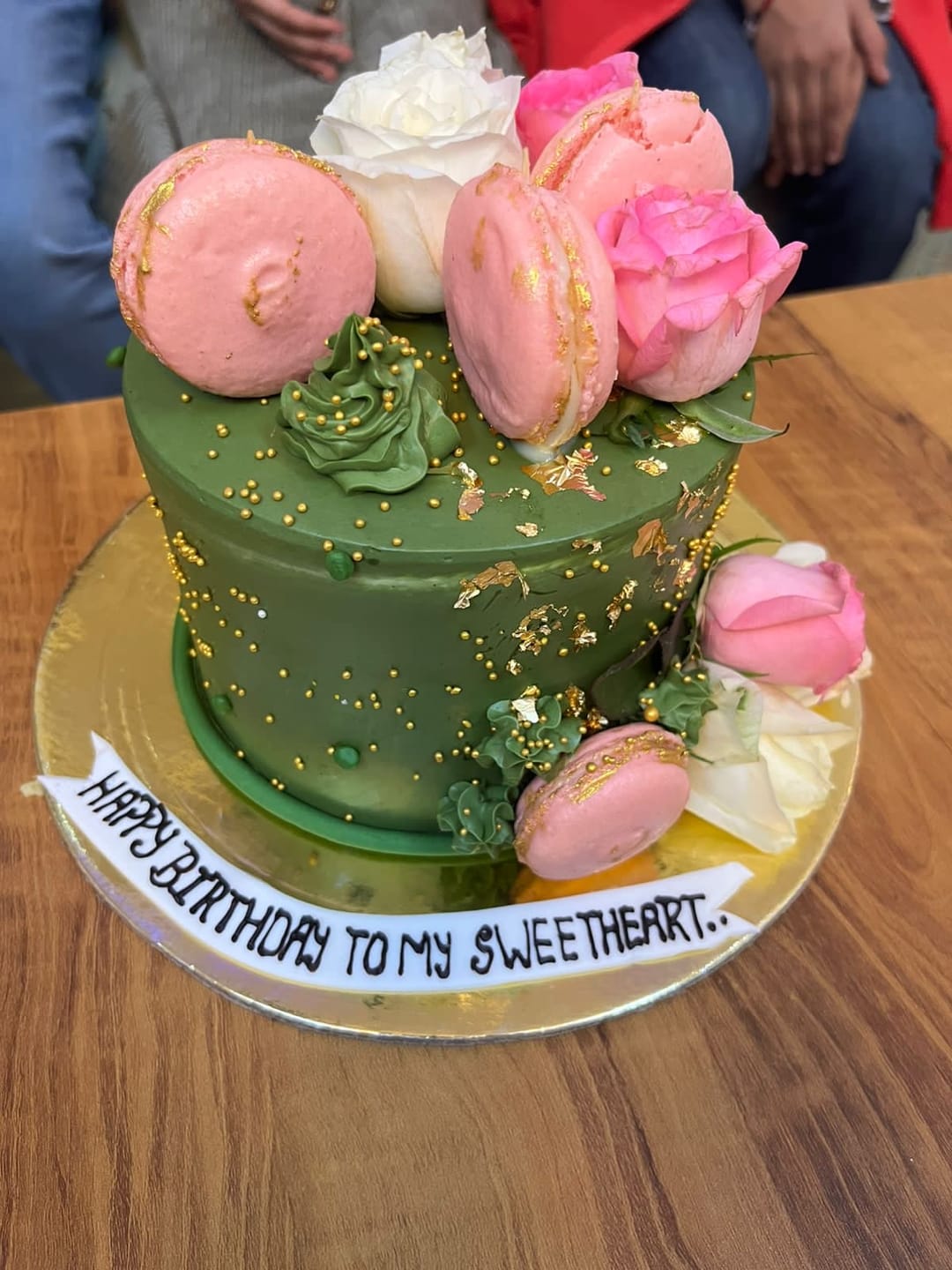 Customer photo review of Bottle Green Floral Cake