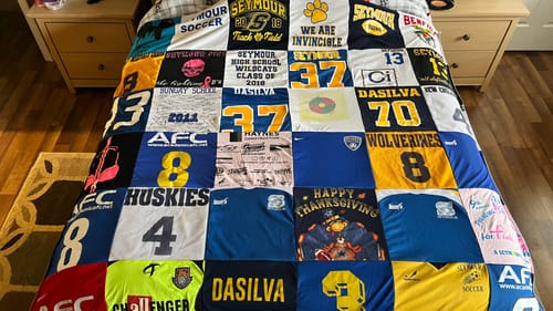 T-shirt quilt featuring huskies, wolverines by Alexandra from CT