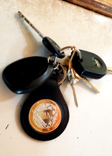 Customer photo review of Sobriety Mint Genuine Leather 34mm AA Medallion Keychain Holder - Recovery Chip/Coin/Token Holder - Tan