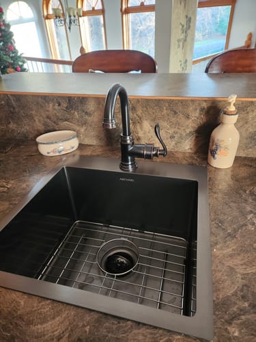 Customer photo review of Single Hole Bathroom Faucet With Swivel Spout Bronze