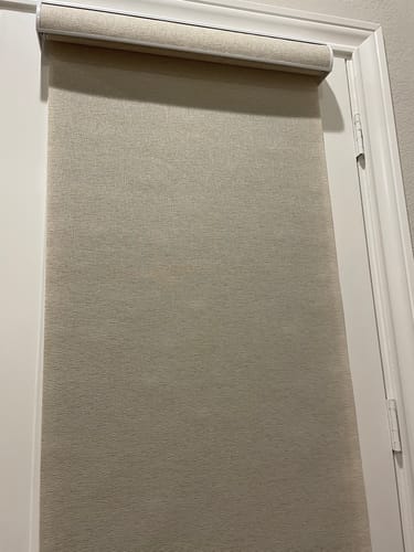 Customer photo review of SmartWings Motorized Light Filtering Roller Shades 70% Blackout Safari