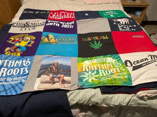 T-shirt quilt with music festivals, travel themes by Kristine from MA