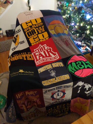 T-shirt quilt with education, cheerleading themes by Bonnie from OH
