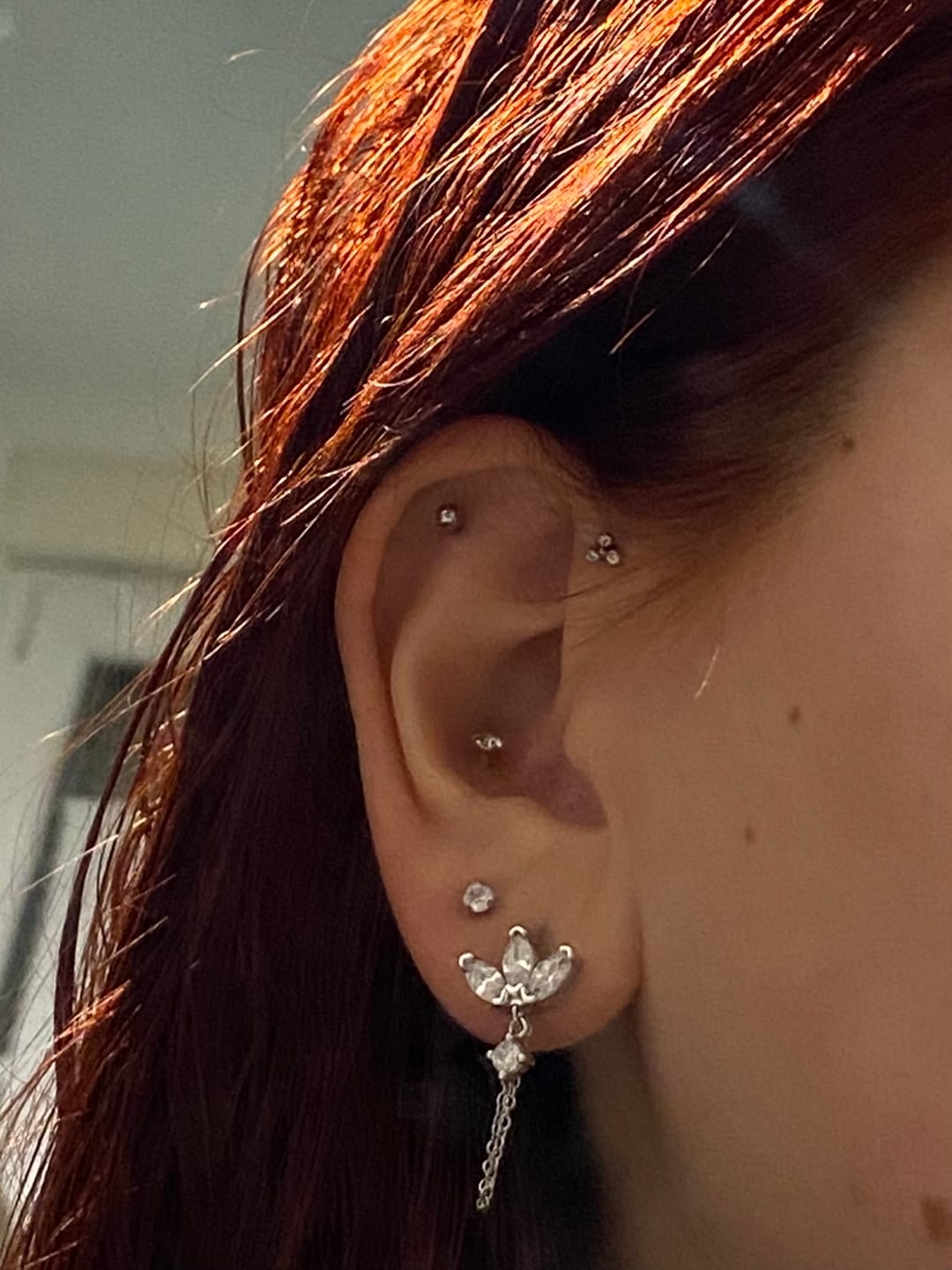 Customer photo review of Limitless Sky Lotus Ohrstecker 14K Vergoldet