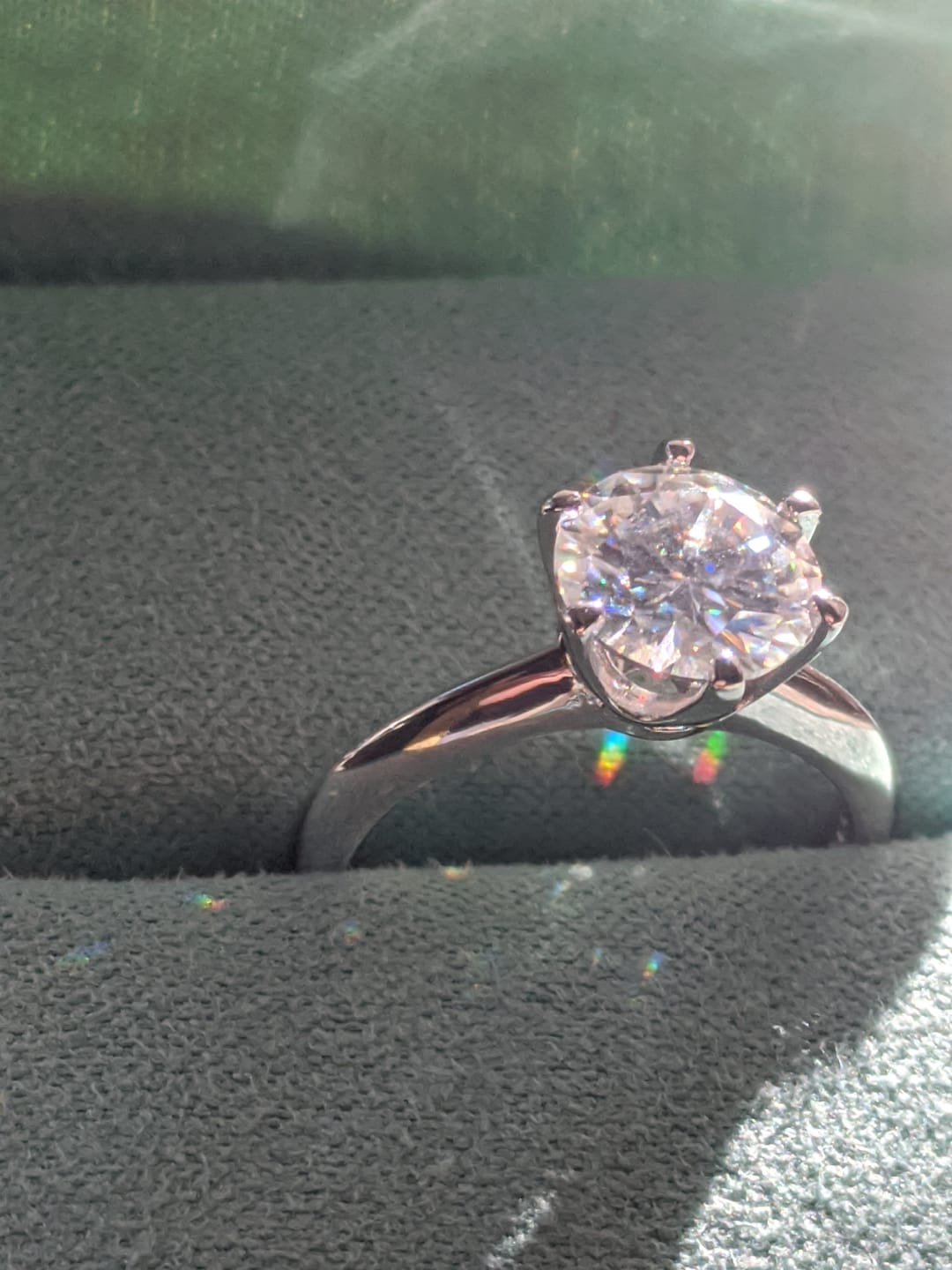 Customer photo review of Classic Solitaire Moissanite Six-Prong Sterling Silver Engagement Ring