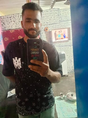Customer photo review of AMIRI T-shirt