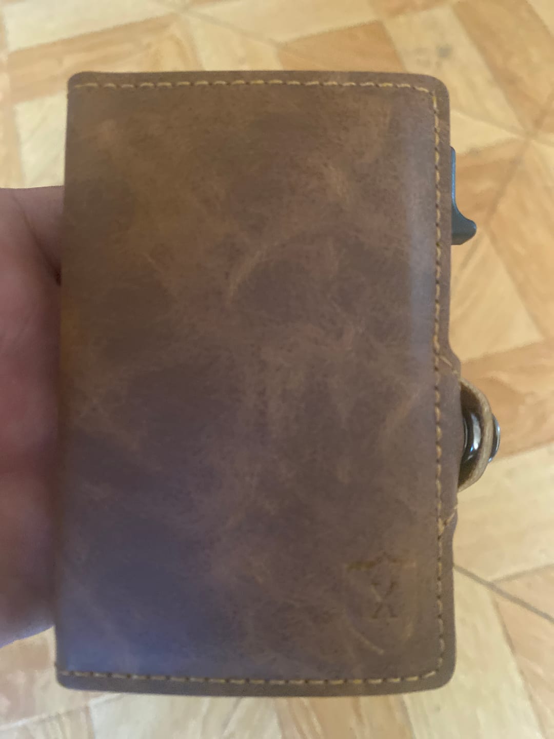 Customer photo review of Gold Brown Airtag
