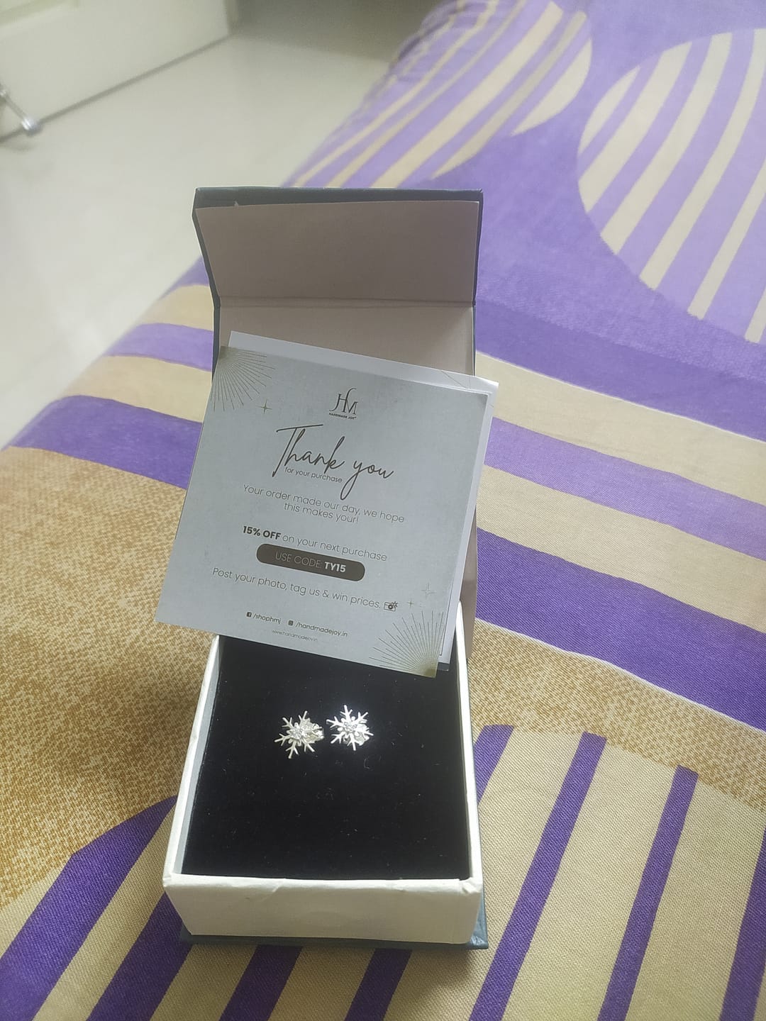 Customer photo review of Snowflake Sterling Silver Studs