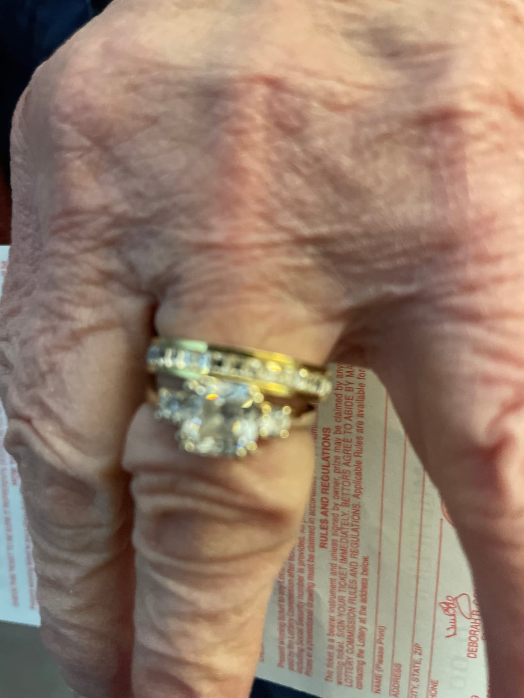 Customer photo review of 4MM 14k Gold Princess Cut Women's Eternity Titanium Ring Wedding Band with CZ
