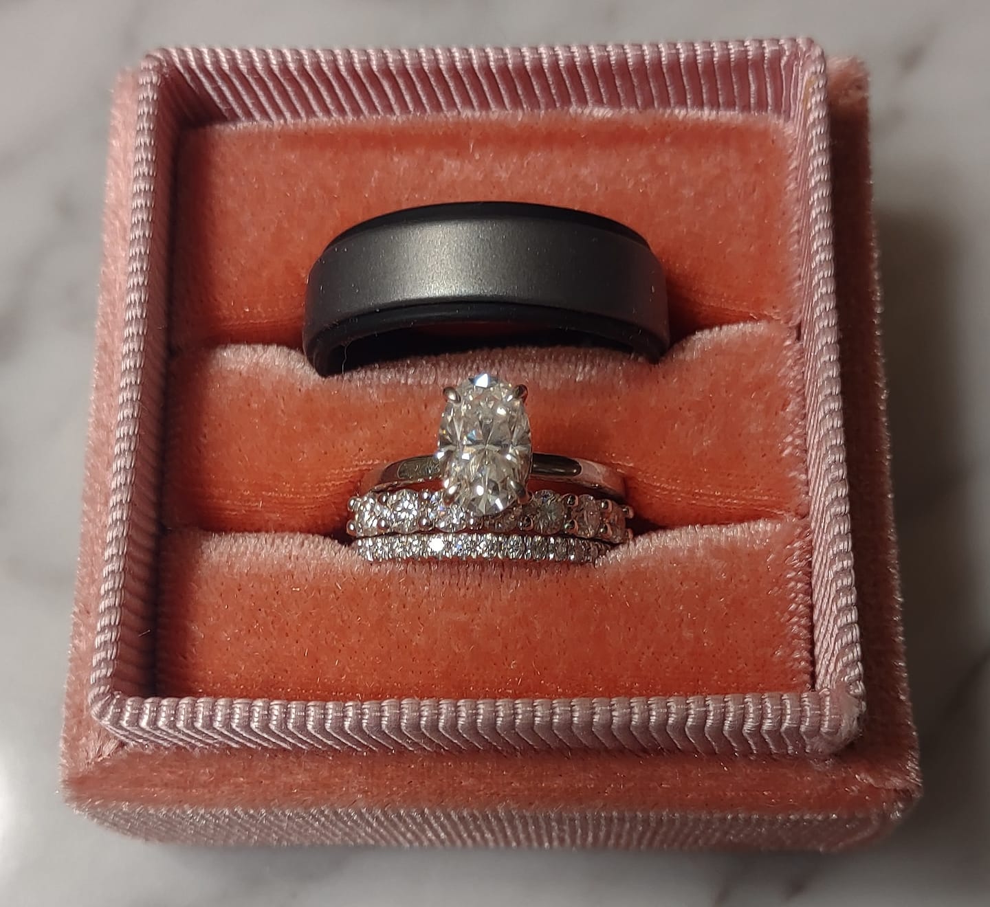 Customer photo review of Round Moissanite Sterling Silver Wedding Band Stackable Ring