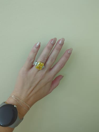 Customer photo review of Three Stone Radiant Cut Yellow Sapphire Two Tone Sterling Silver Ring