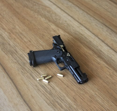 Customer photo review of Mini Combat Master 2011 Shell Ejection Toy Keychain