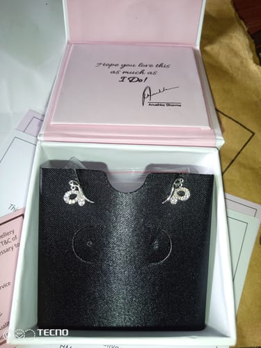 Customer photo review of Silver Love Like A Butterfly Studs