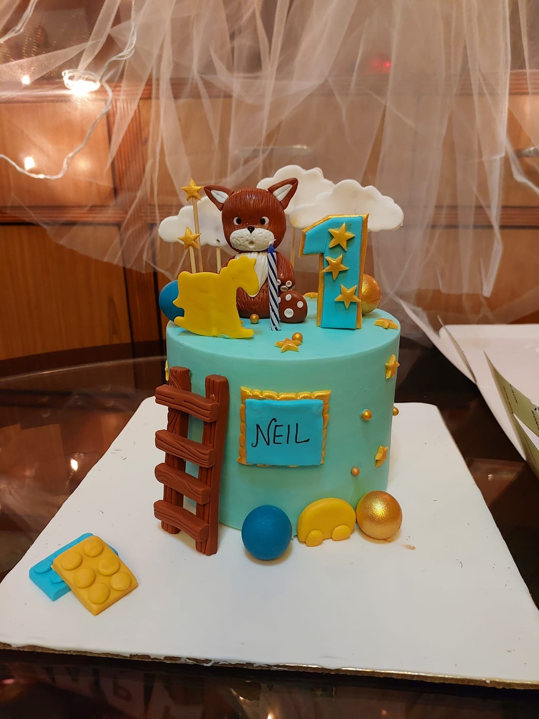 Customer photo review of Teddy and ladder Cake