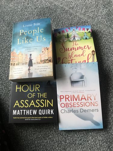 Customer photo review of Surprise Subscription Box of 4 Fiction Books