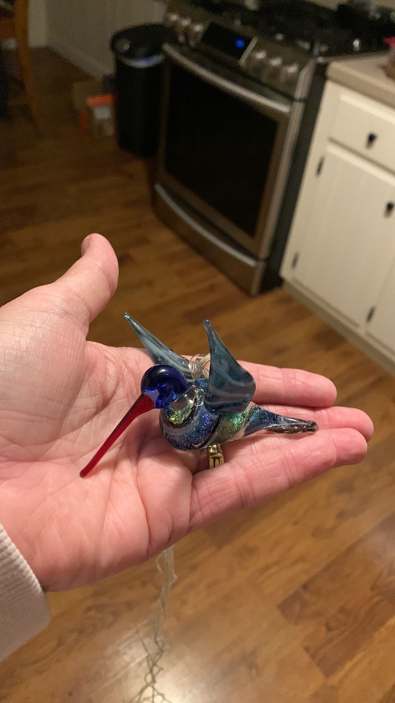 Customer photo review of Dichroic Twist Glass Hummingbird with Infused Ash
