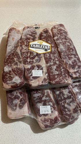 Reseña con foto de un cliente sobre Tablita de lomo