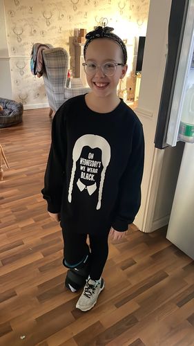 Customer photo review of On Wednesdays We Wear Black Sweatshirt