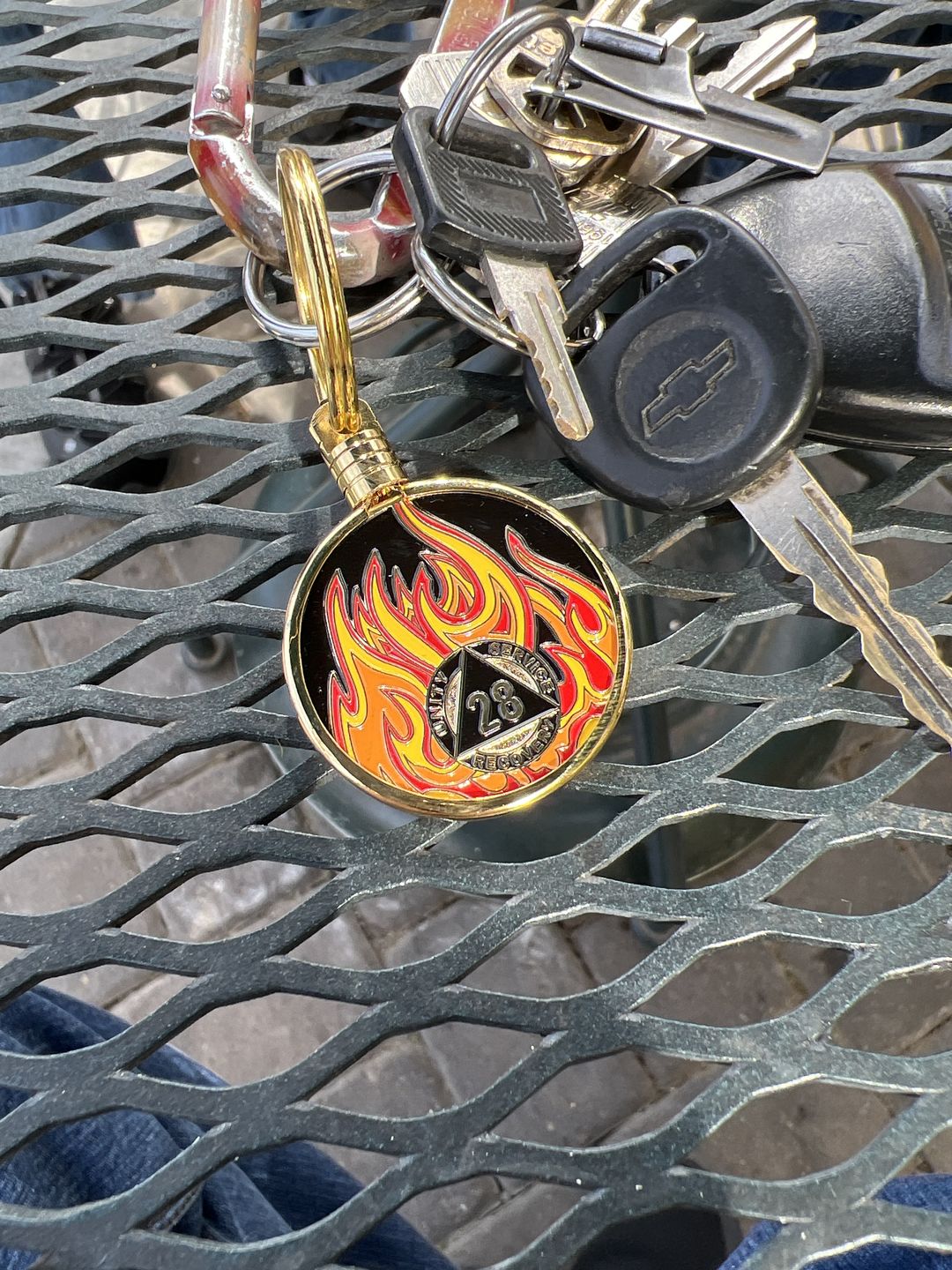 Customer photo review of 1 to 40 Year Sobriety Mint Twisted Flames Gold Plated AA Recovery Medallion/Chip/Coin - Black/Red/Orange/Yellow