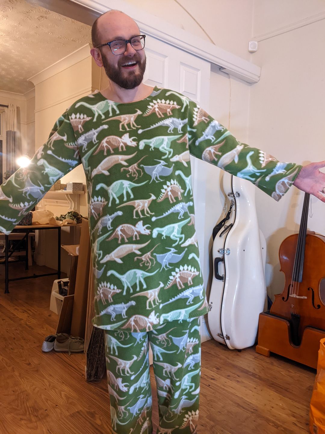Customer photo review of Dino Skeletons on Green Anti Pill Polar Fleece Fabric